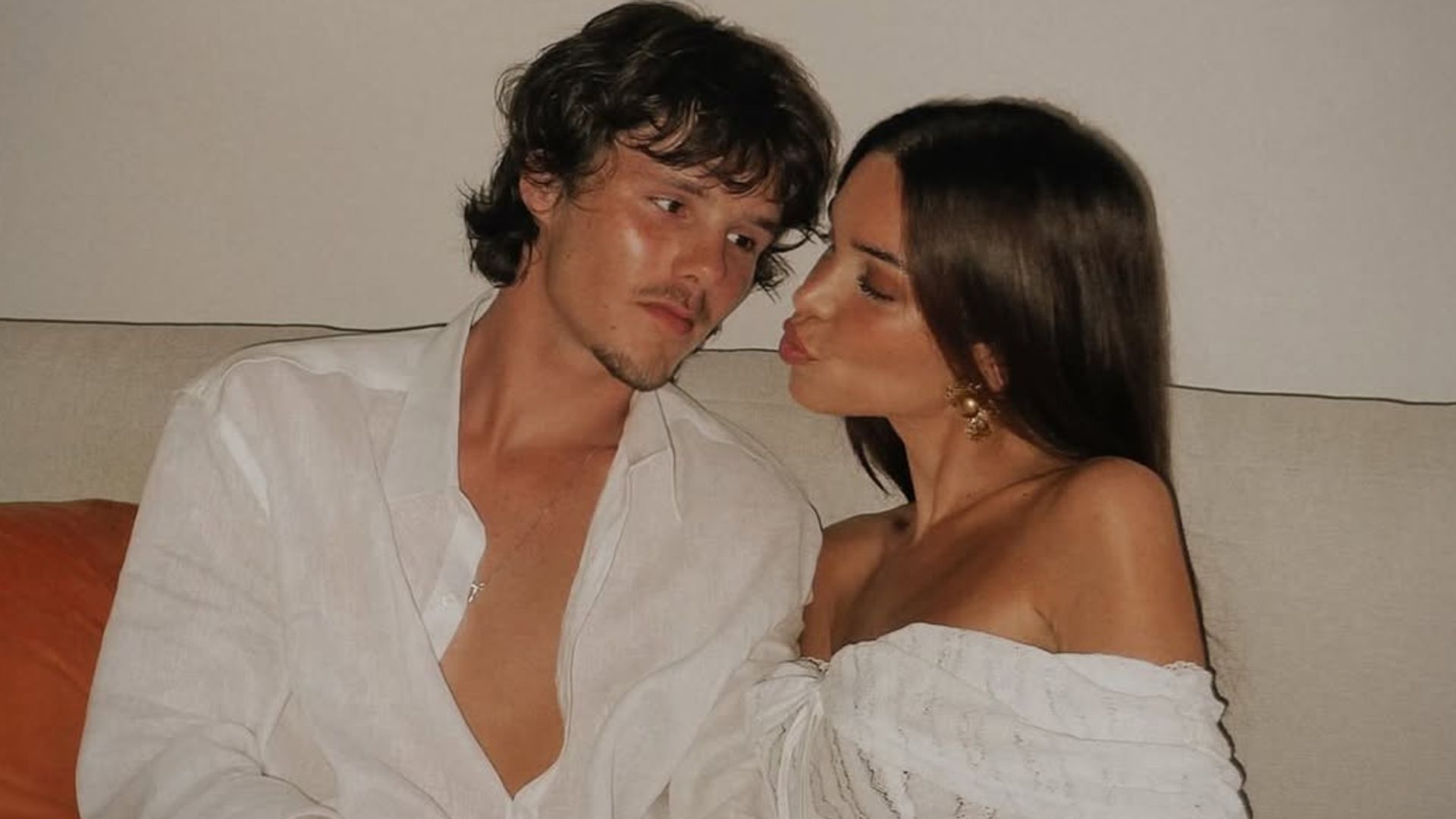 jackie apostel in a white dress with cruz beckham