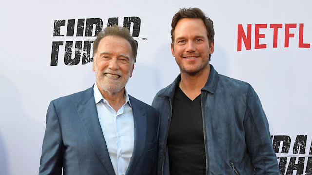 arnold schwarzenegger on red carpet with chris pratt