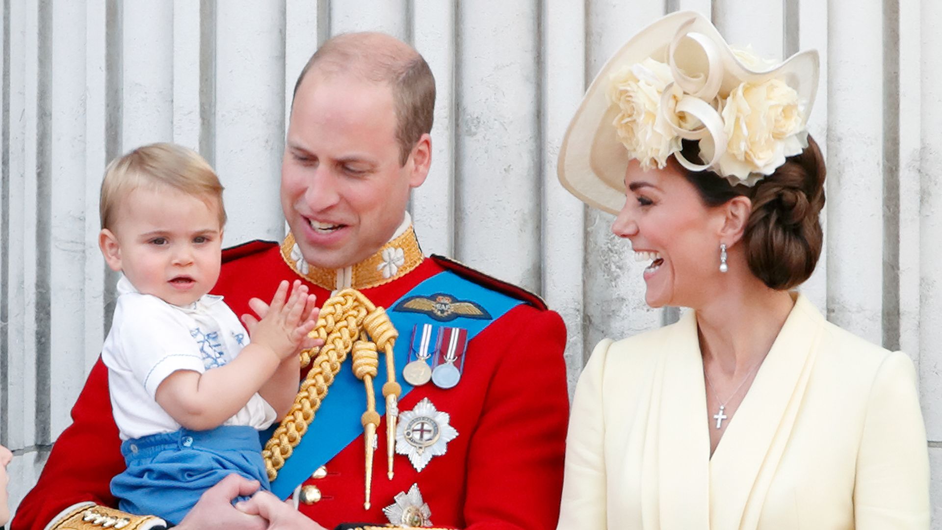 Prince Louis clapping on palace balcony with William and Kate