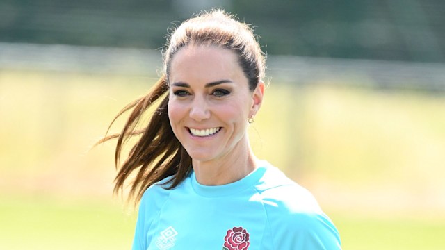 Princess Kate  visiting Maidenhead rugby club wearing a blue tshirt