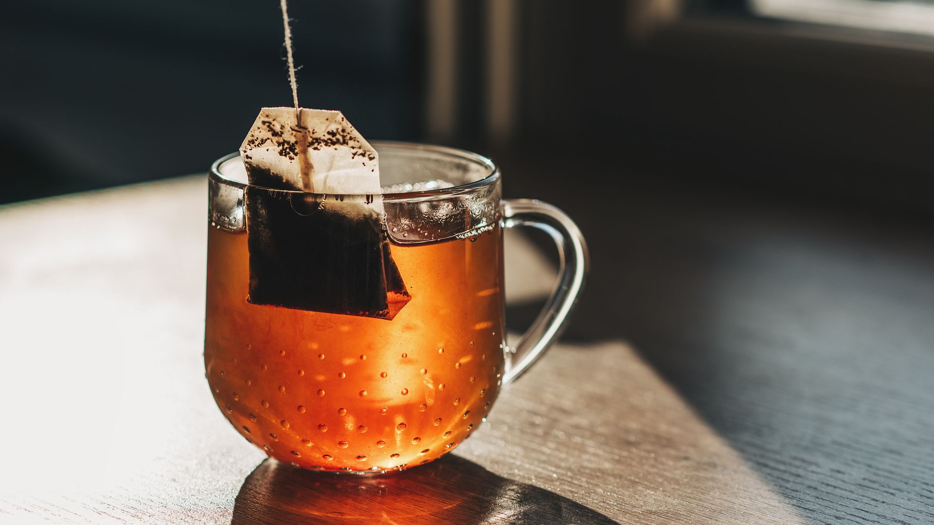 Tea bag put in transparent glass teacup