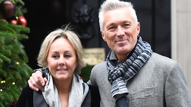 Shirlie Kemp in a black suit with Martin Kemp outside number 10 Downing Street at Christmas