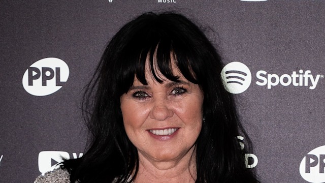 Coleen Nolan wearing a silver top 