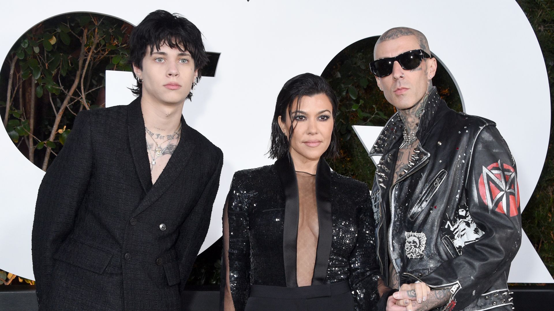 Landon Asher Barker, Kourtney Kardashian, and Travis Barker attend the 2022 GQ Men Of The Year Party on November 17, 2022 in West Hollywood, California