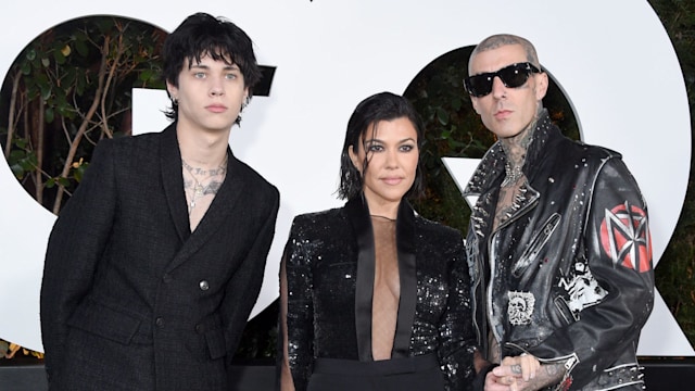 Landon Asher Barker, Kourtney Kardashian, and Travis Barker attend the 2022 GQ Men Of The Year Party on November 17, 2022 in West Hollywood, California