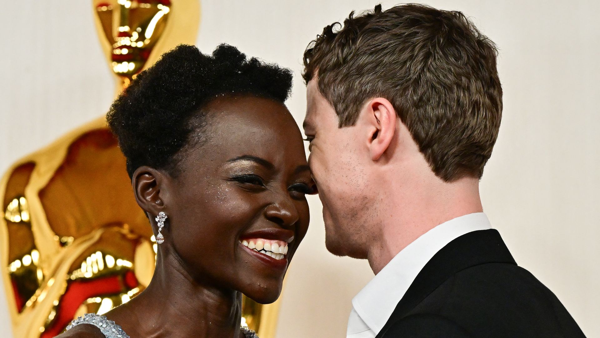 Kenyan-Mexican actress and film director Lupita Nyong'o and British actor Joseph Quinn attend the 96th Annual Academy Awards at the Dolby Theatre in Hollywood, California on March 10, 2024. (Photo by Frederic J. Brown / AFP) (Photo by FREDERIC J. BROWN/AFP via Getty Images)