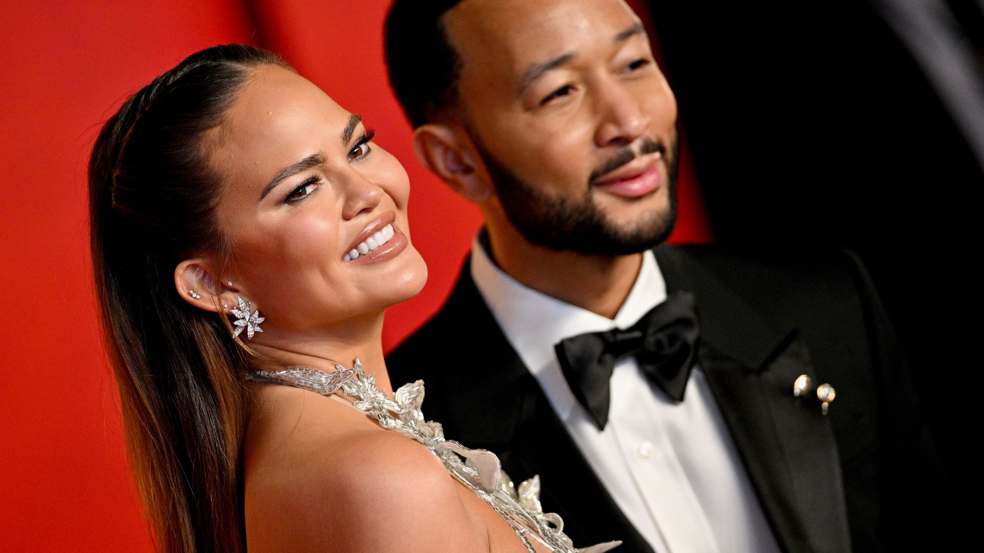BEVERLY HILLS, CALIFORNIA - MARCH 10: Chrissy Teigen, John Legend attend the 2024 Vanity Fair Oscar Party Hosted By Radhika Jones at Wallis Annenberg Center for the Performing Arts on March 10, 2024 in Beverly Hills, California. (Photo by Lionel Hahn/Getty Images)