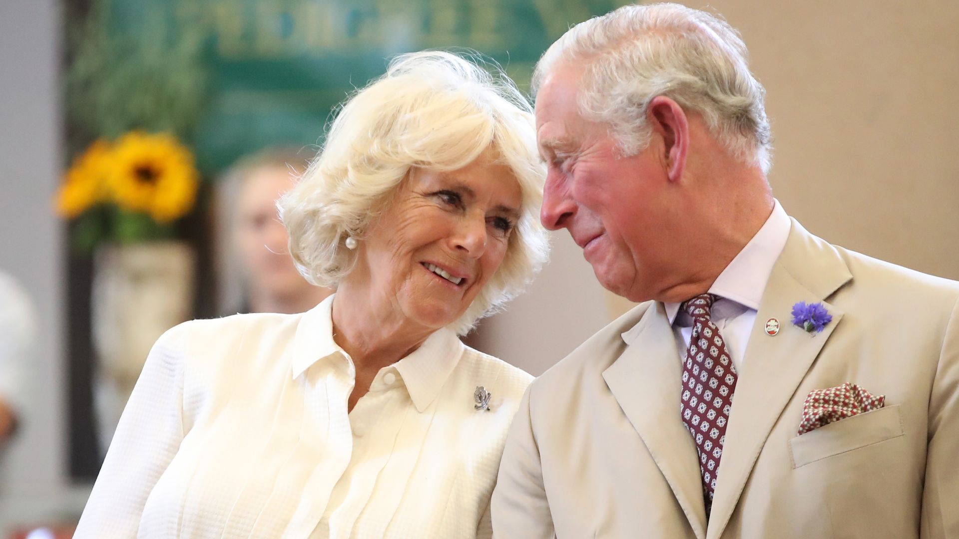 King Charles and Queen Camilla gazing at one another