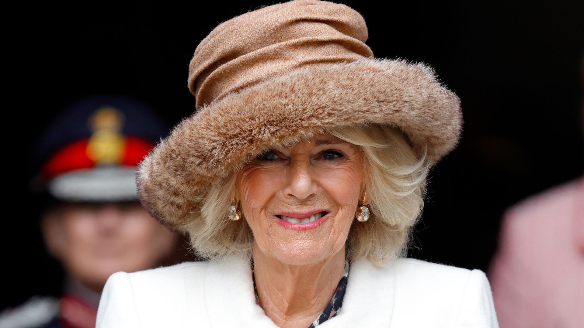 Queen Camilla carries a traditional Nosegay bouquet as she attends the Royal Maundy Service at Worcester Cathedral 