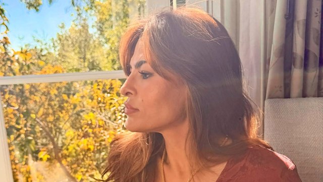 eva mendes starring out of a window