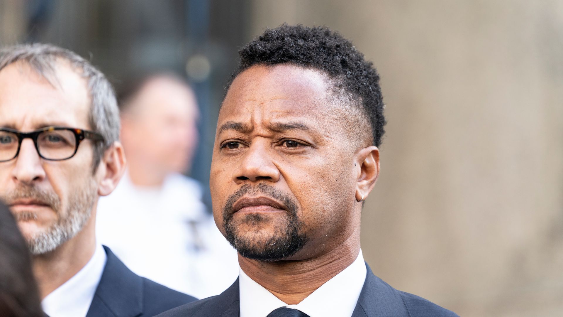 Cuba Gooding Jr. listens as attorney Mark Heller addresses press after arraignment in Manhattan's New York State Supreme Court.
Actor Cuba Gooding Jr. is facing charges of sexual abuse.