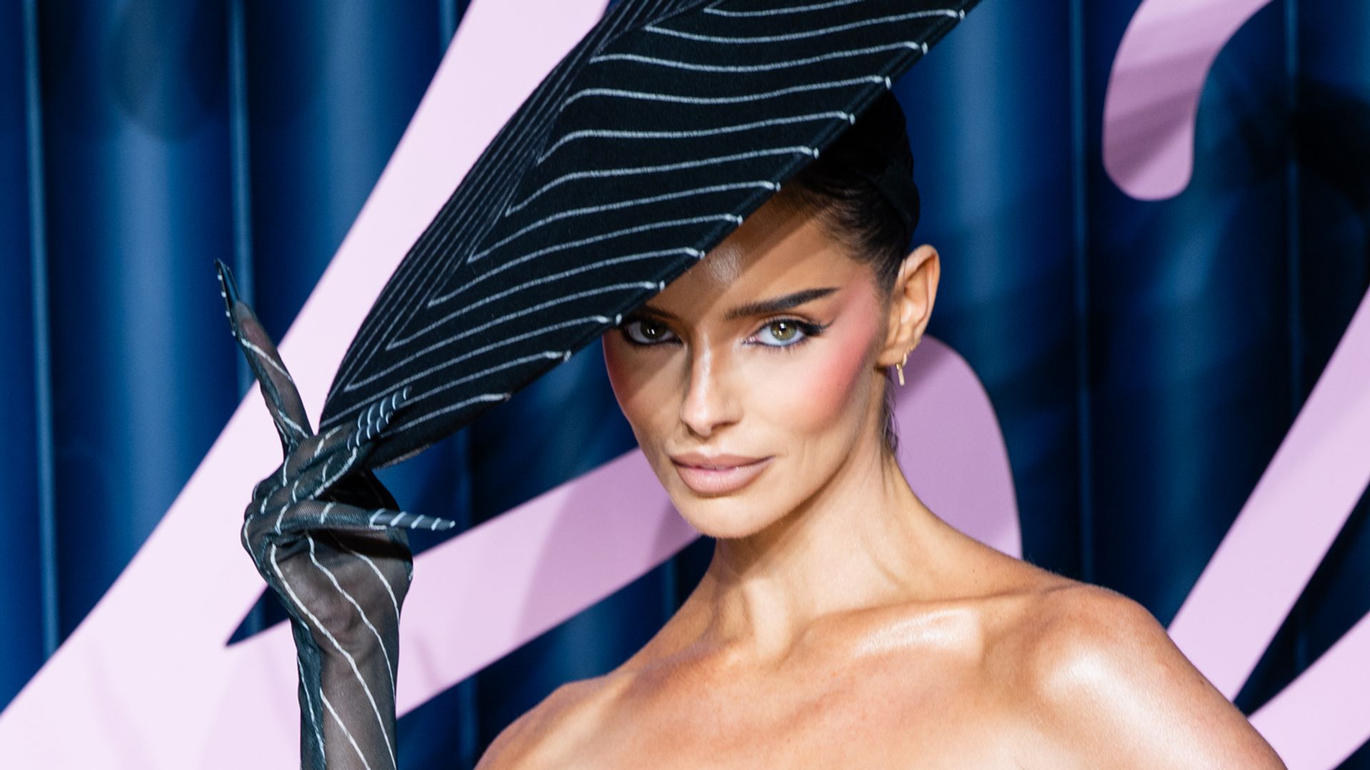 Maura Higgins perfects the 'underwear as outerwear' trend in crisp white lingerie on the red carpet