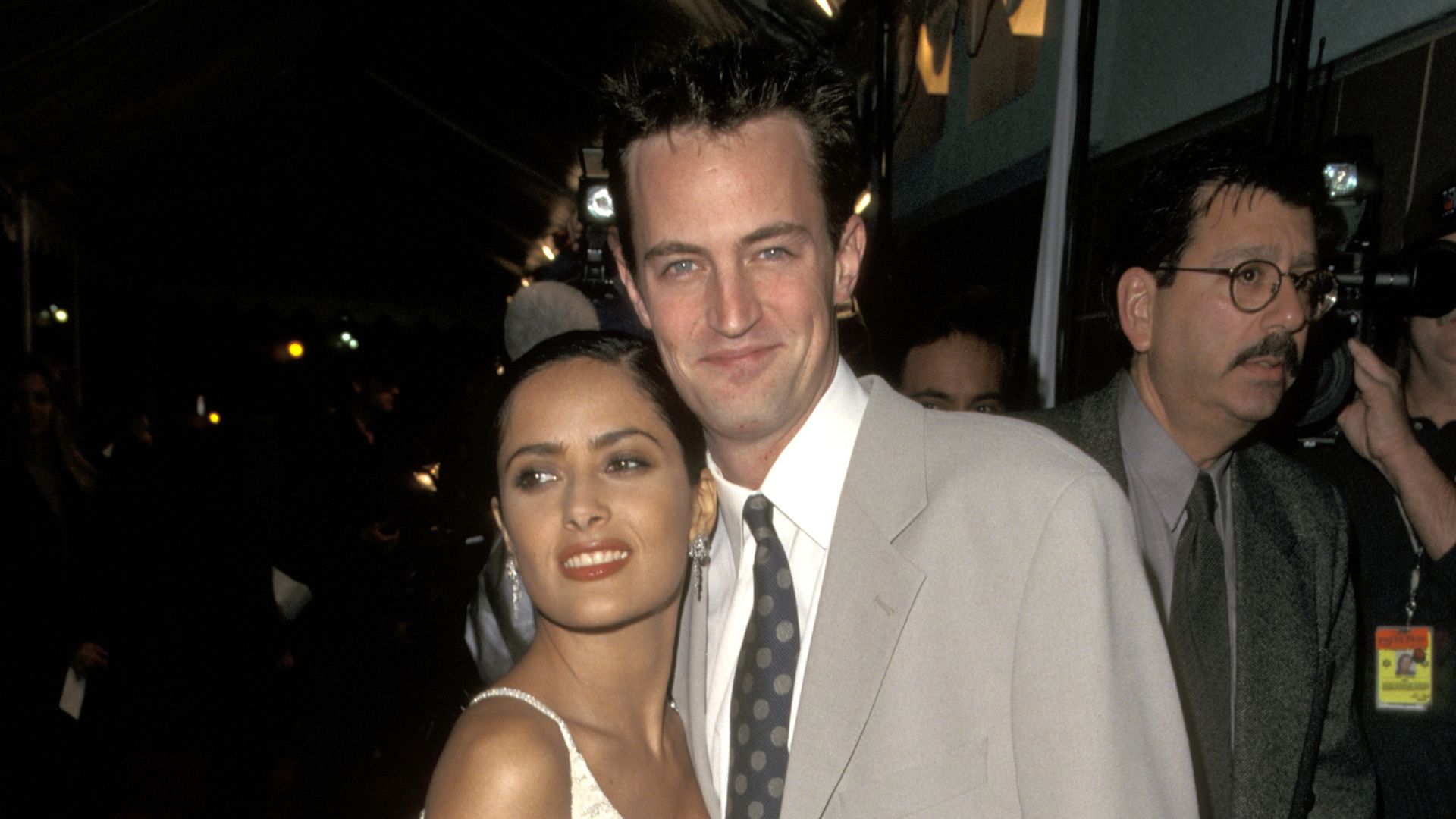 Salma Hayek and Matthew Perry at the Fools Rush in premiere in los Angeles on February 11, 1997