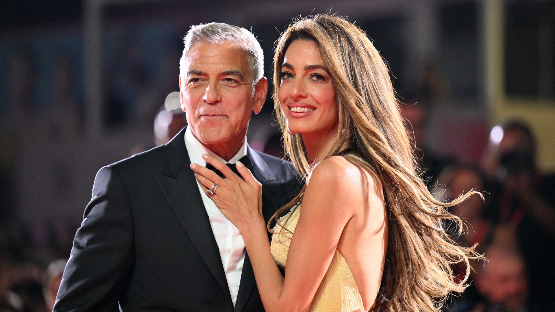 George Clooney and his wife Amal Clooney attend the red carpet of the movie "Wolfs" presented out of competition during the 81st International Venice Film Festival at Venice Lido, on September 1, 2024