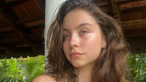 Carys Douglas vacation photo wearing brown bikini going makeup free
