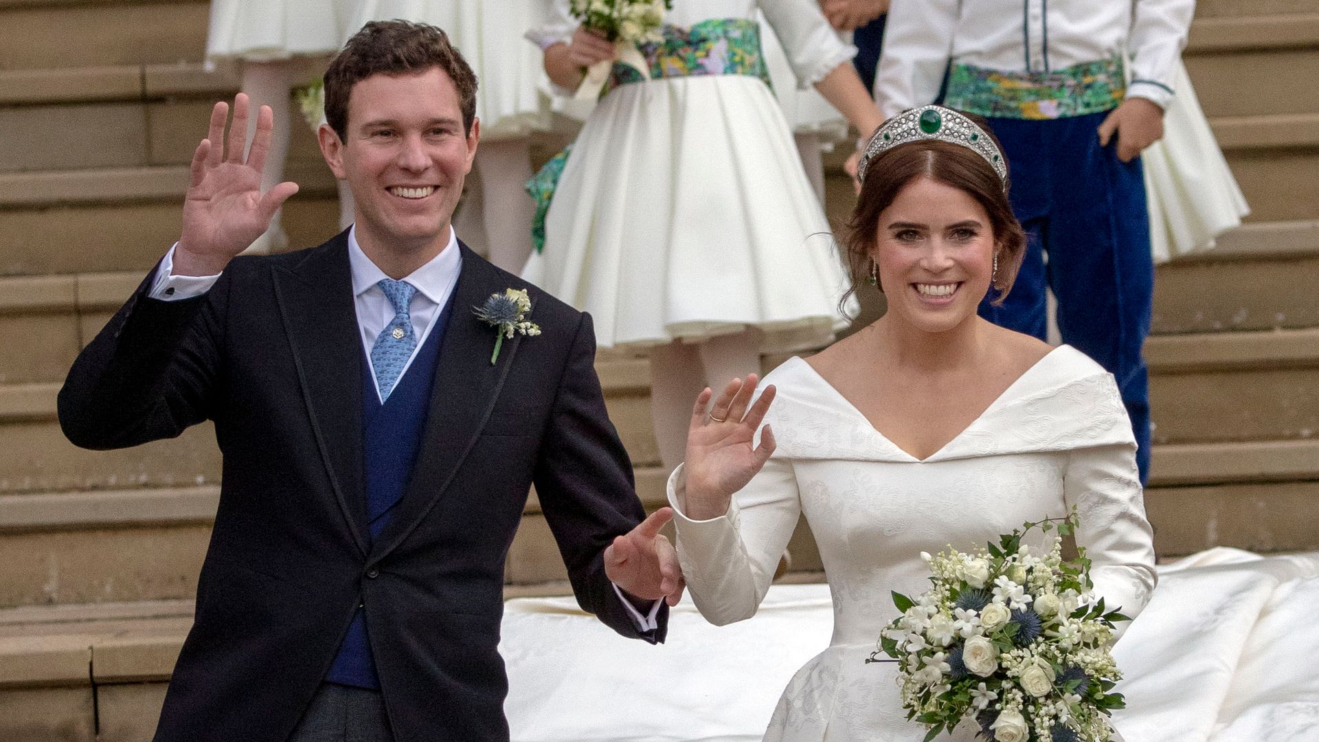 Princess Eugenie and Jack Brooksbank leave St George's Chapel in Windsor Castle following their wedding on October 12, 2018 in Windsor, England