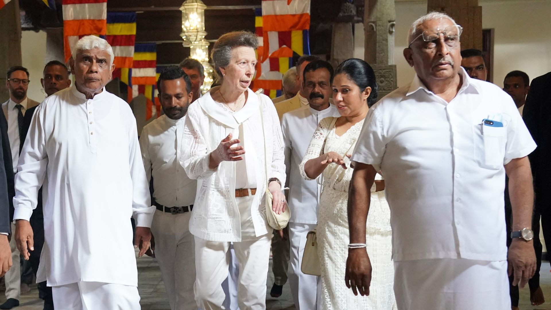 Princess Anne wearing all white-outfit to Buddhist Temple, Sri Lanka
