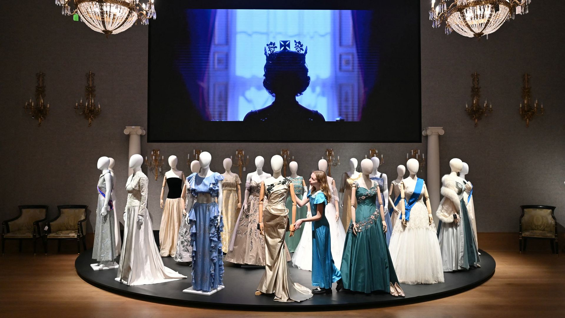 TOPSHOT - Costumes are pictured during a photocall for an exhibition of props for items used in the filming of the Netflix series 'The Crown', at Bonhams auctioneers in London on January 9, 2024, ahead of an auction of the items. The Exhibition, ahead of Bonhams' 'The Crown Auction', is set to run from January 11 until February 5, with the auction set to take place on February 7. (Photo by JUSTIN TALLIS / AFP) (Photo by JUSTIN TALLIS/AFP via Getty Images)