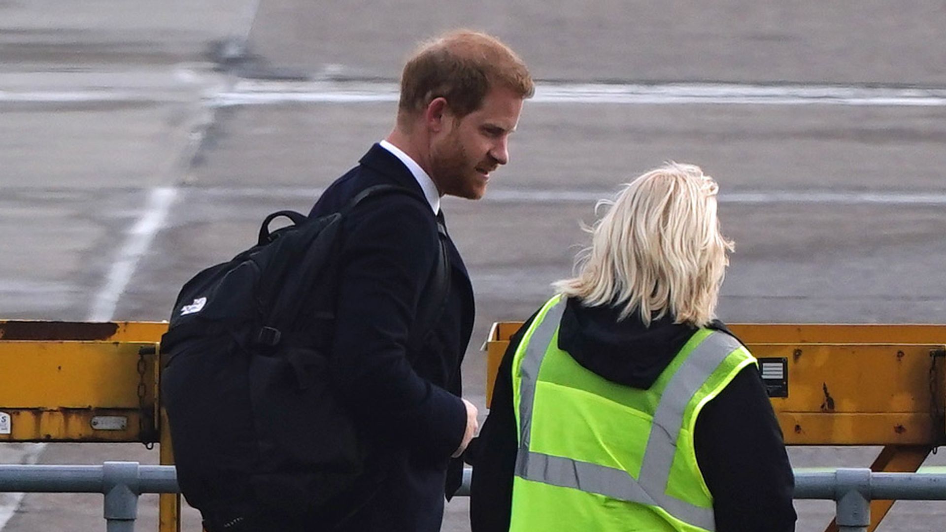 Prince Harry boards plane Aberdeen Airport 