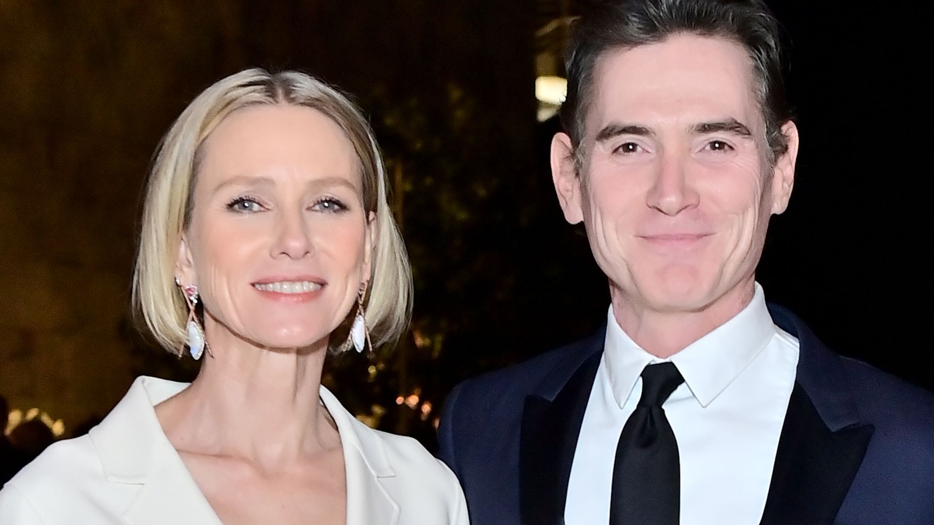 Naomi Watts in a white suit and Billy Crudup in a blue suit at ELLE's 29th Annual Women in Hollywood celebration