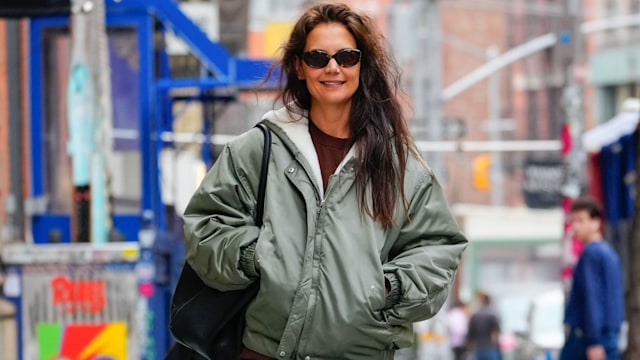 katie holmes in green bomber