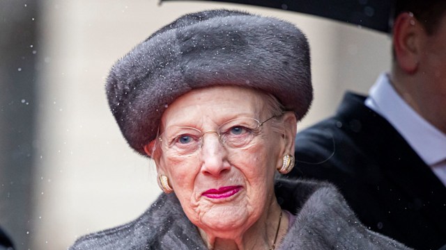 Queen Margrethe of Denmark wrapped up warm in a furry coat and hat