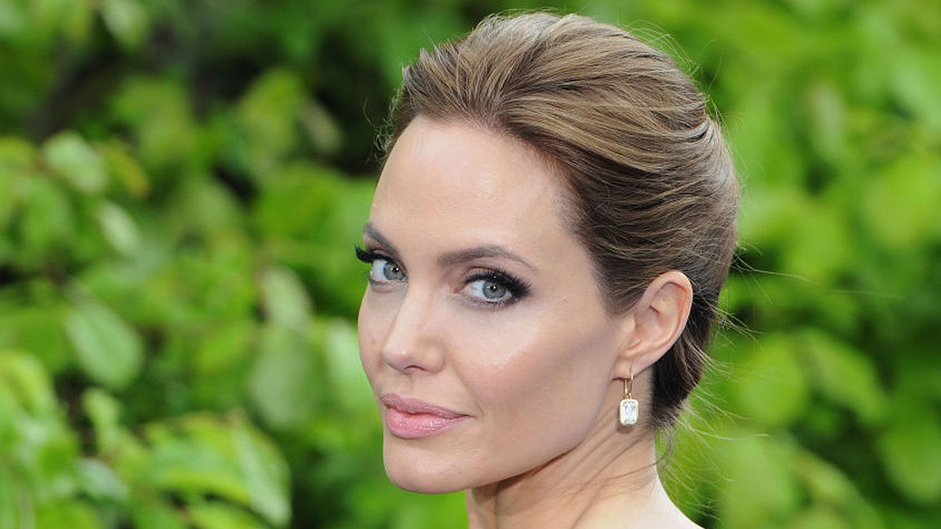 Close up of Angelina Jolie smiling. 