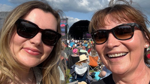 mother and daughter posing at festival