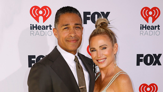 tj holmes and amy robach on red carpet