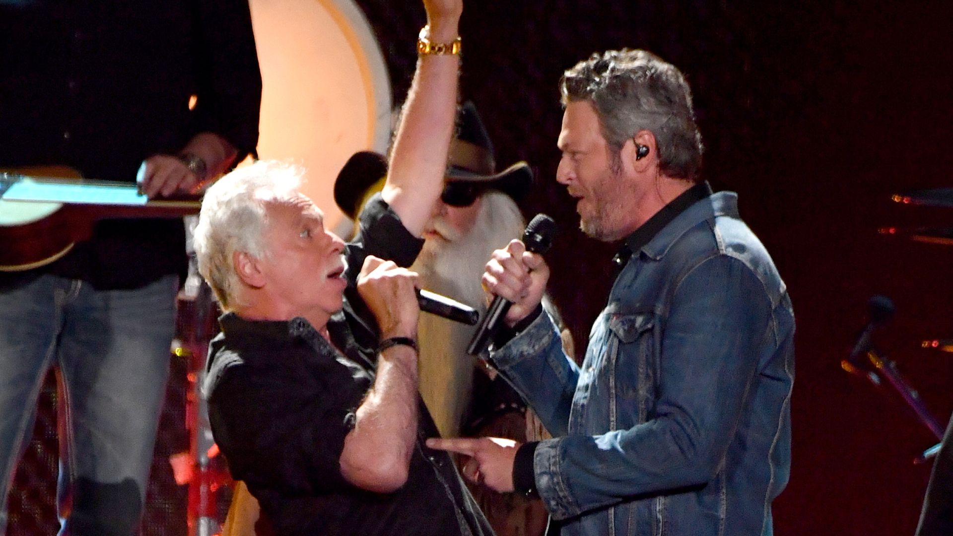 Blake Shelton (center) performs with the Oak Ridge Boys' Joe Bonsall and Richard Sterban onstage during the 2016 CMT Music awards at the Bridgestone Arena on June 8, 2016 in Nashville, Tennessee.