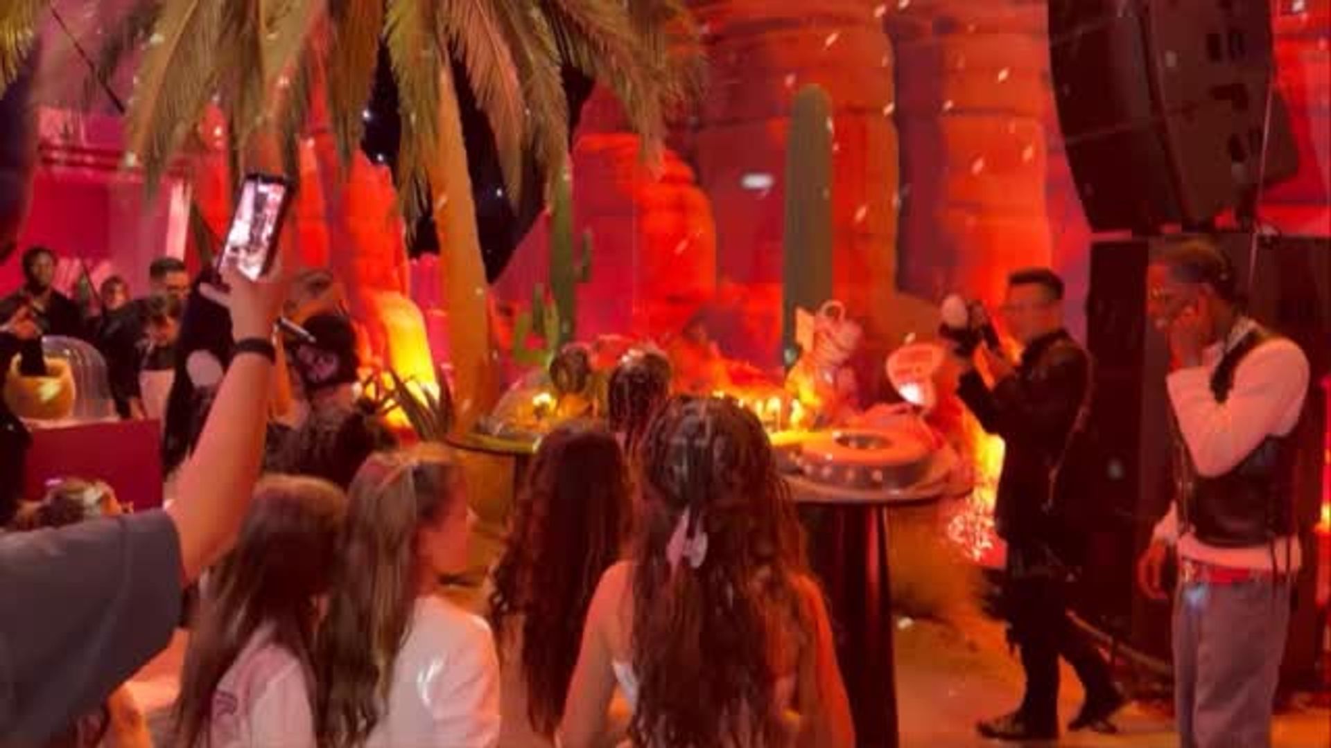 Kylie Jenner and Travis Scott prepare to sing happy birthday to their daughter Stormi at her birthday, shared on Instagram