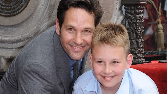 Paul Rudd wit his son Jack kneeling walk of fame