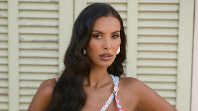 Maya Jama poses in a dress 