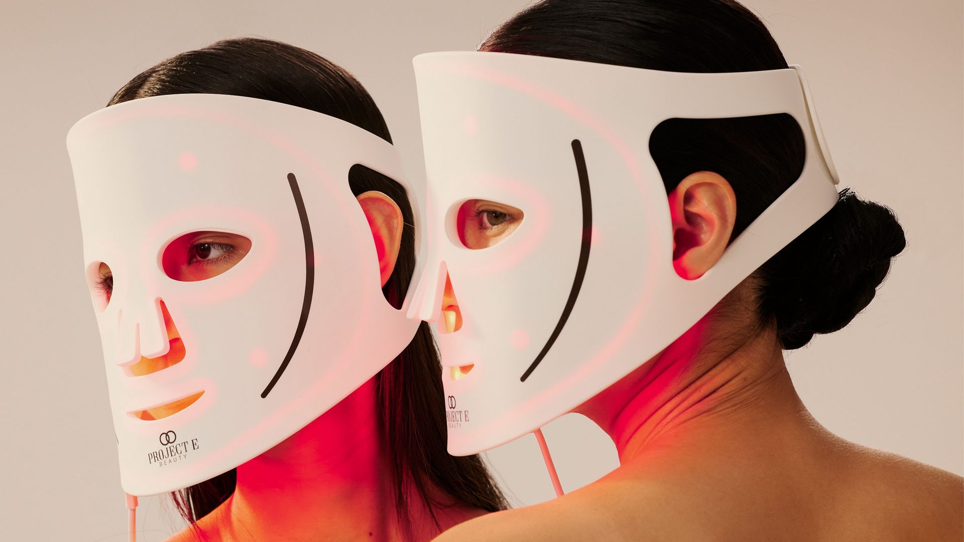 Models wearing LumaLux Face led mask