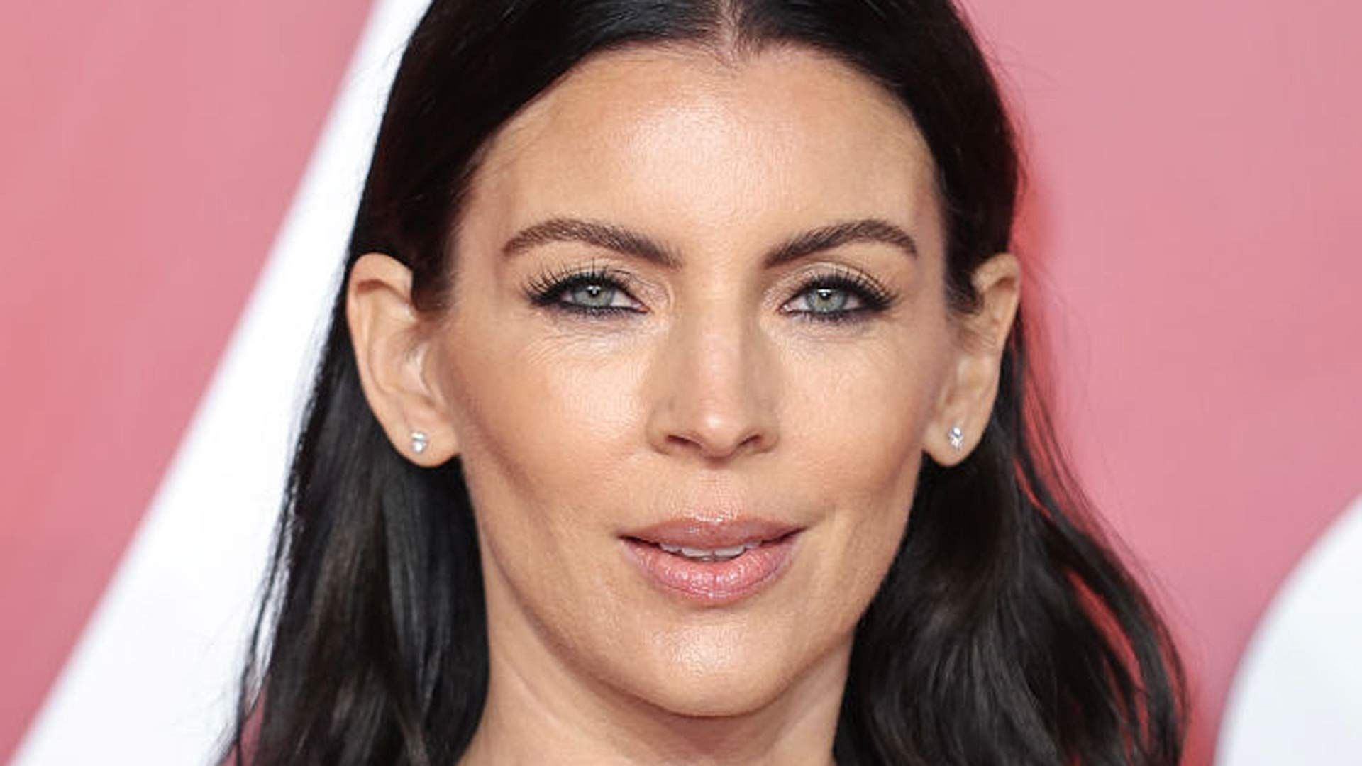 Close up of Liberty Ross posing on the red carpet. 