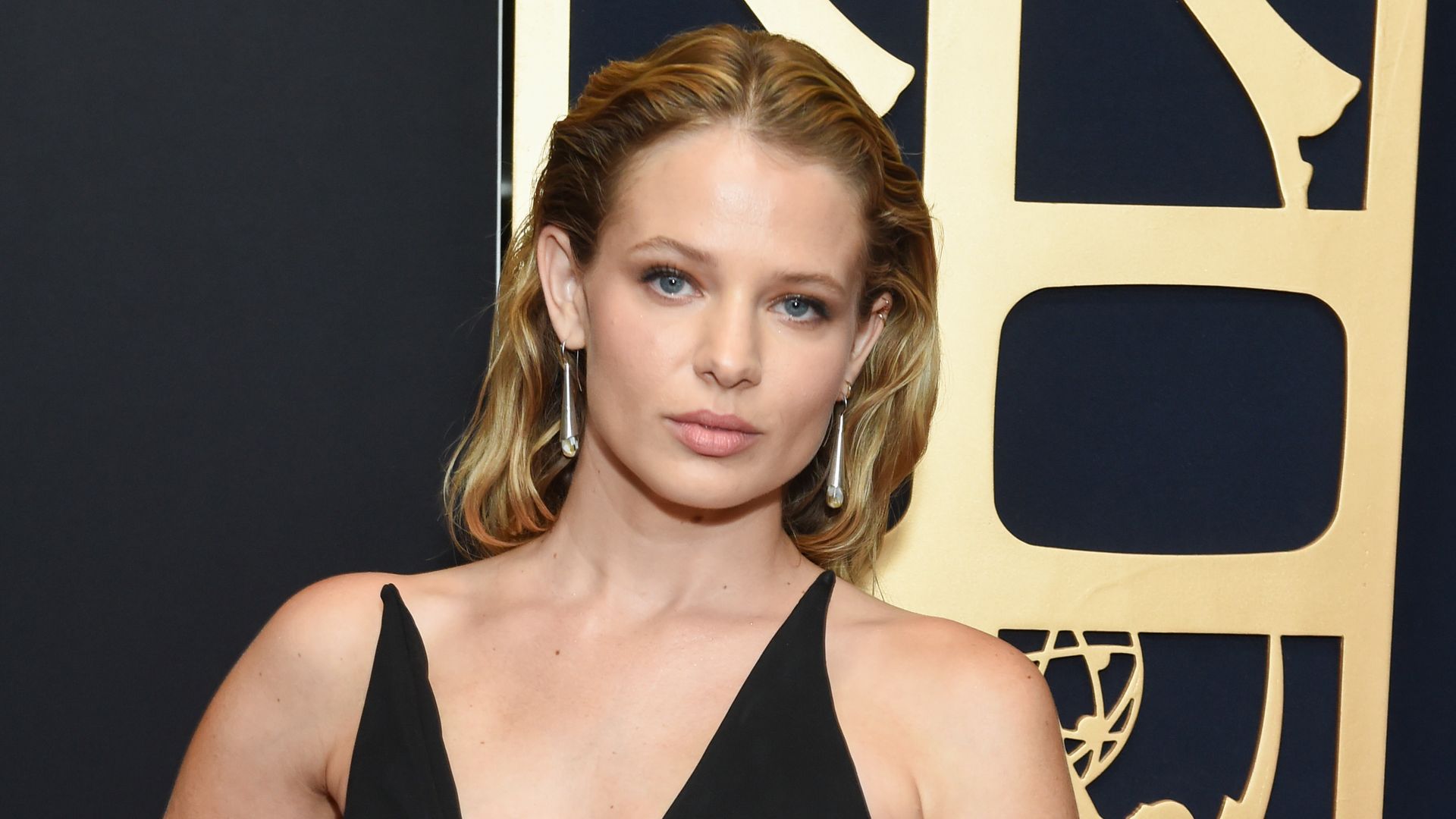 allison lanier wearing black dress at daytime emmys