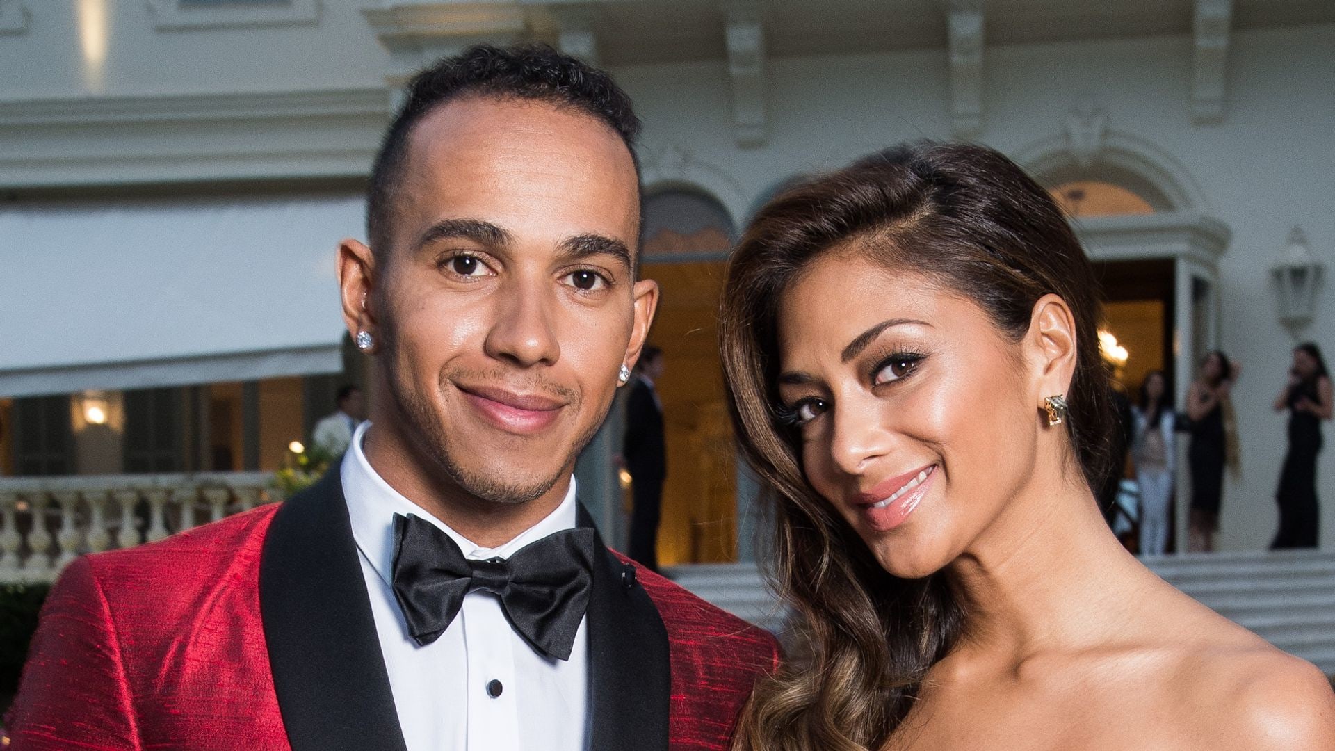Lewis Hamilton and Nicole Scherzinger pose for a portrait at amfAR's 21st Cinema Against AIDS Gala Presented By WORLDVIEW, BOLD FILMS, And BVLGARI at Hotel du Cap-Eden-Roc on May 22, 2014 in Cap d'Antibes, France
