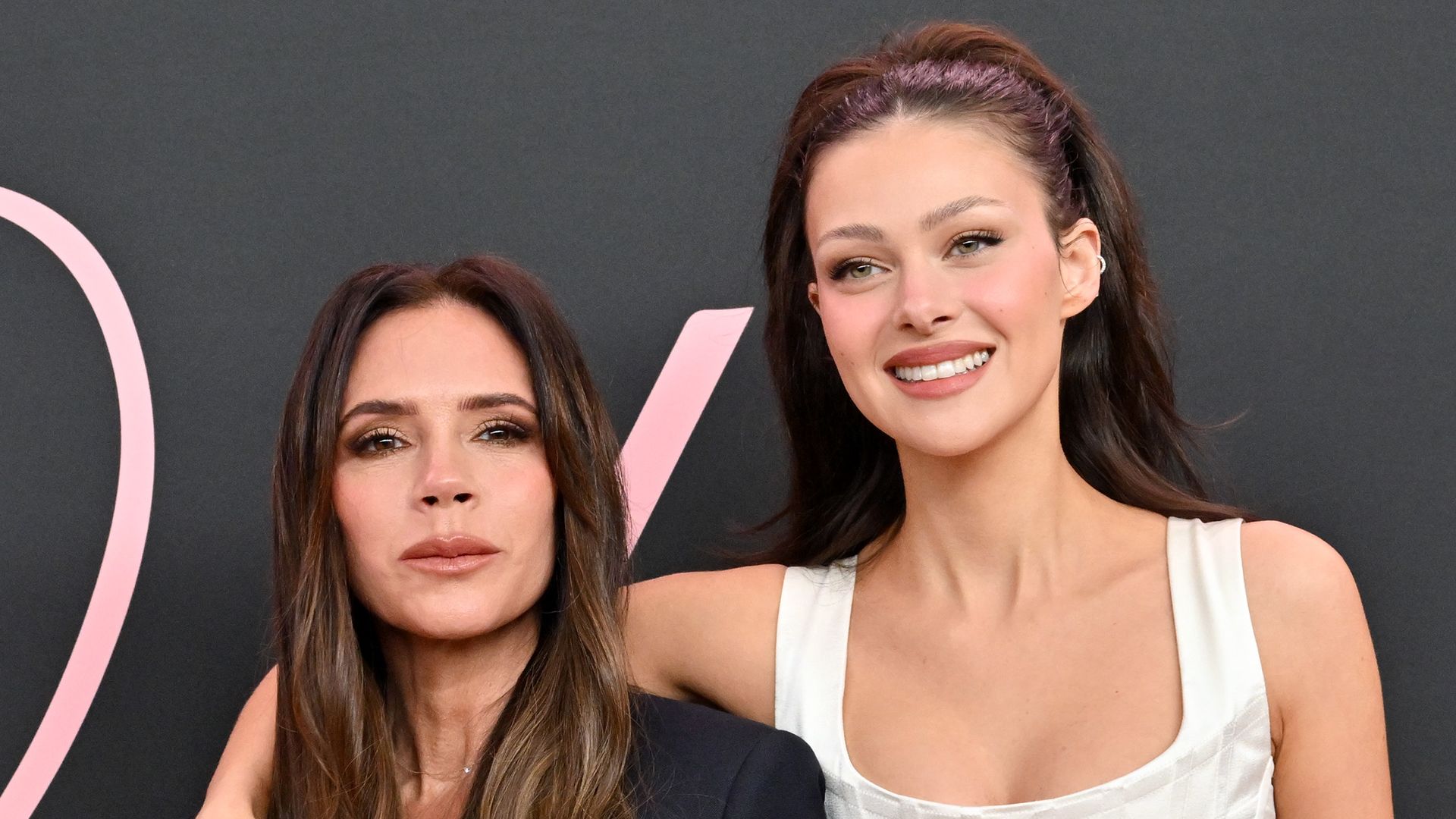 Victoria Beckham and Nicola Peltz Beckham attend the Premiere of "Lola" at Regency Bruin Theatre on February 03, 2024 in Los Angeles, California