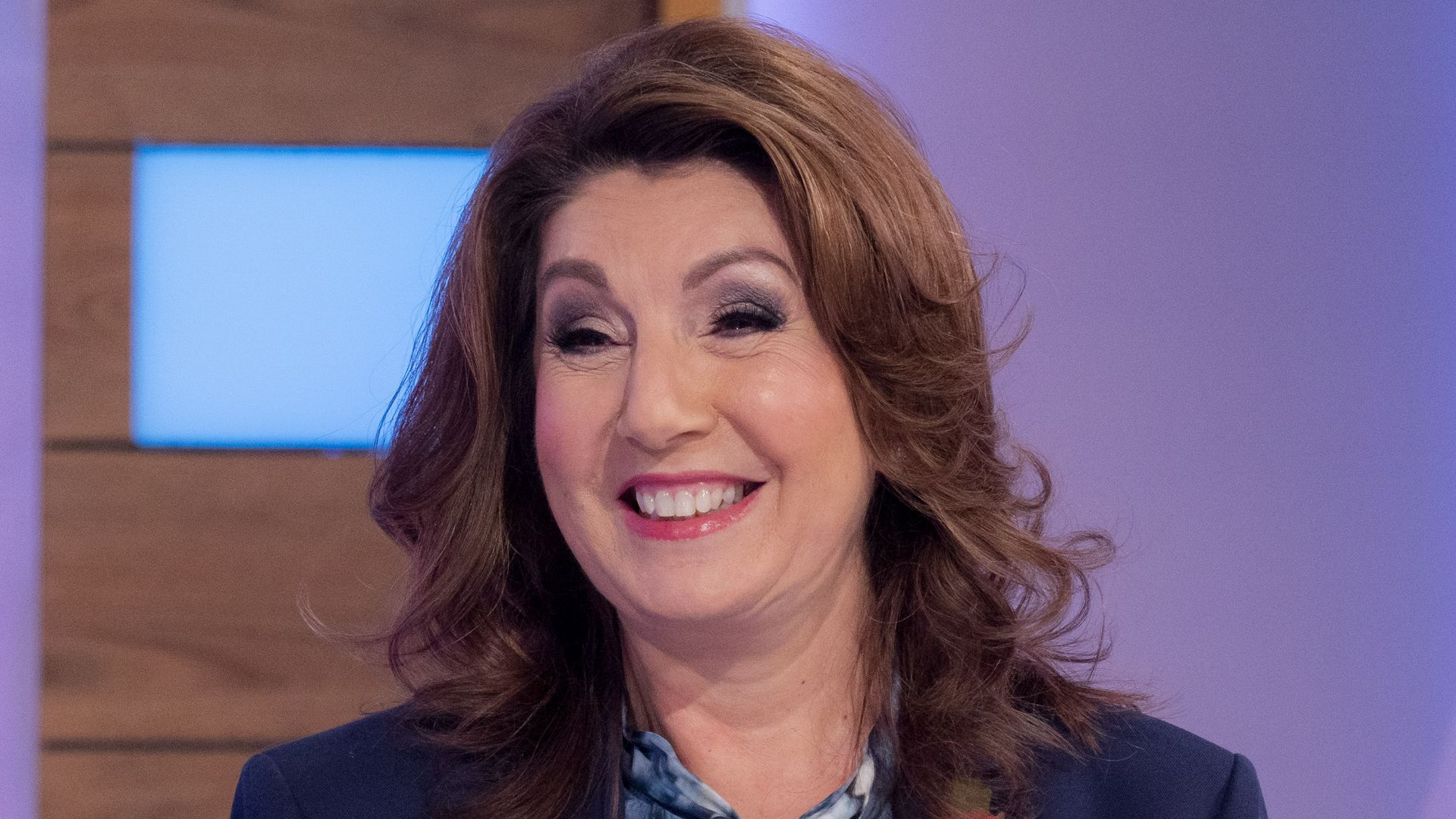 Jane McDonald in blue outfit