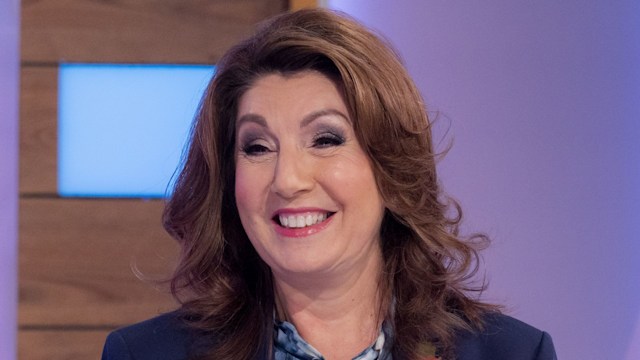 Jane McDonald in blue outfit