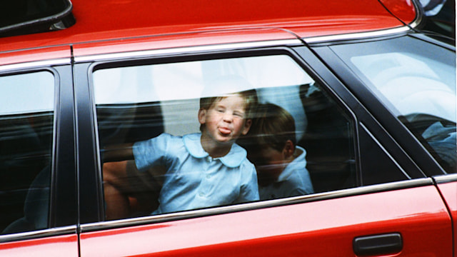 Prince Harry sticking tongue out in 1990