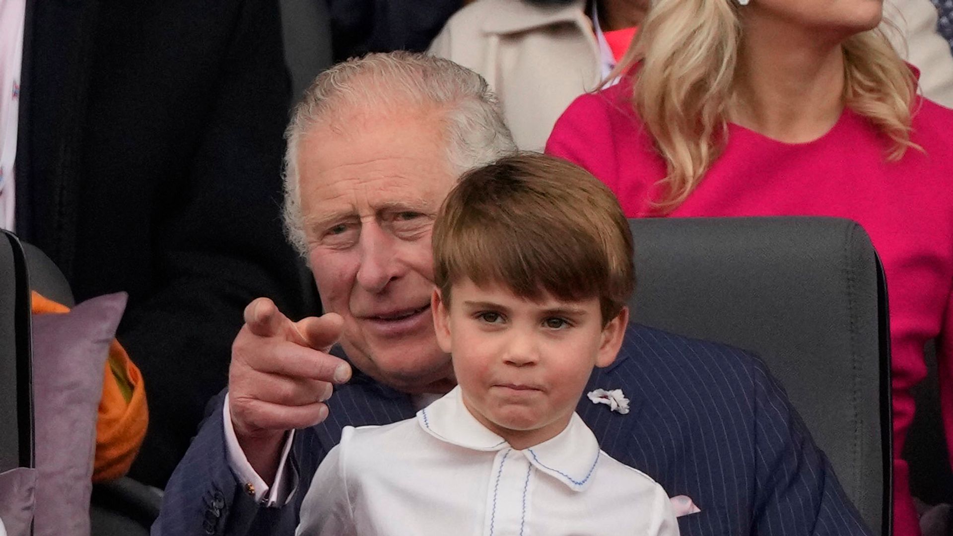 Prince Louis sits on grandpa Charles' lap at the Platinum Jubilee