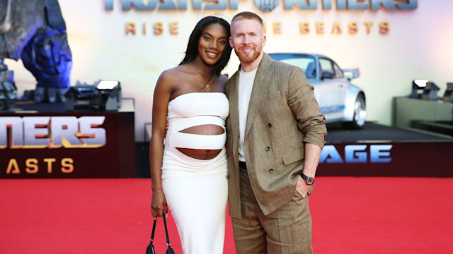 Chyna Mills and Neil Jones on red carpet