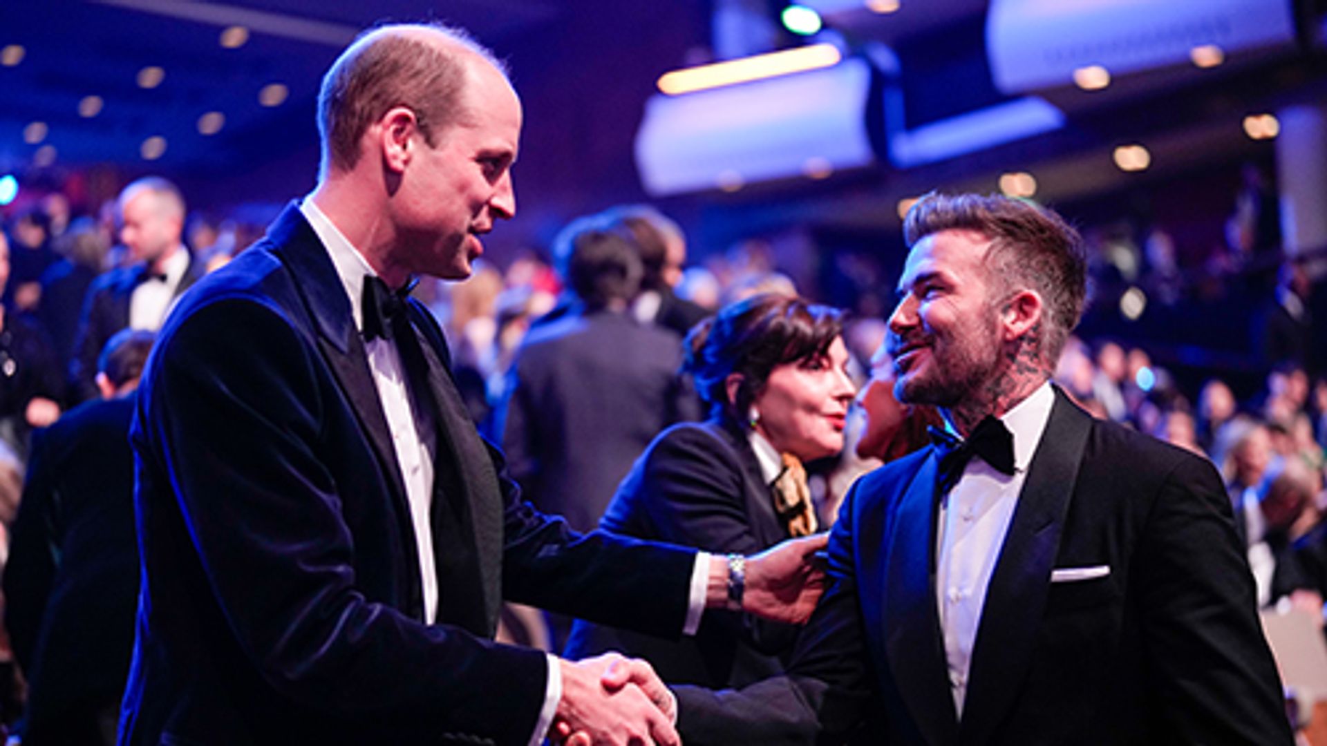 Prince William and David Beckham shaking hands at the BAFTAs