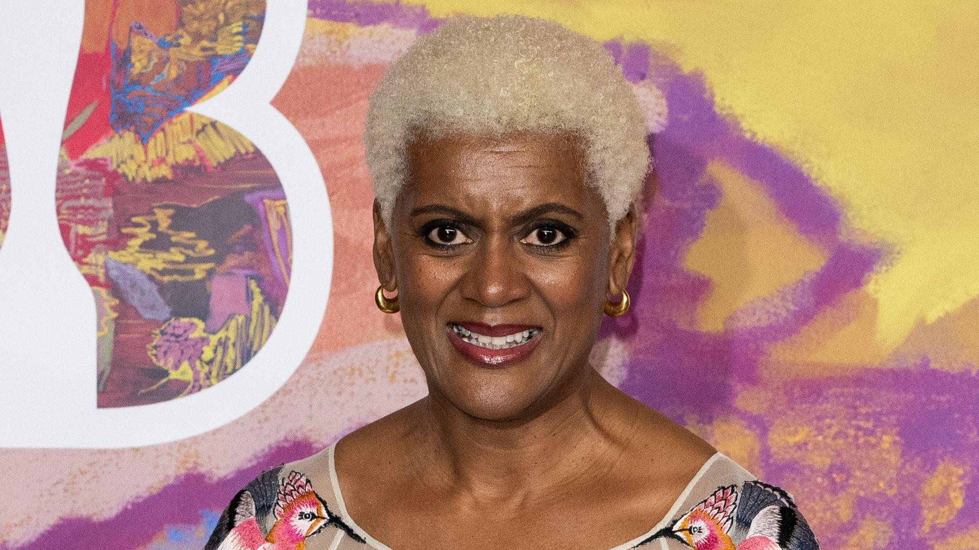 Arit Anderson in a patterned dress at the BRIT Awards