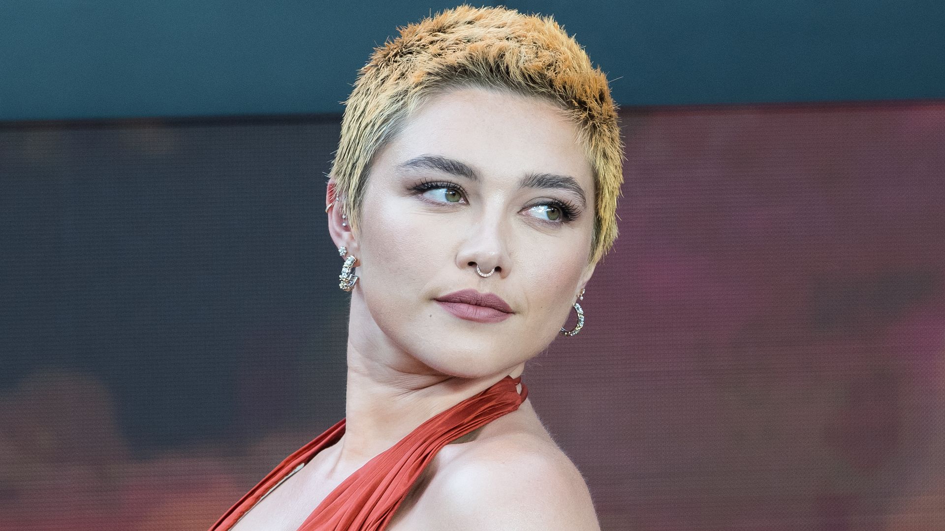 Florence Pugh surprises with fiery hair transformation at Oppenheimer premiere