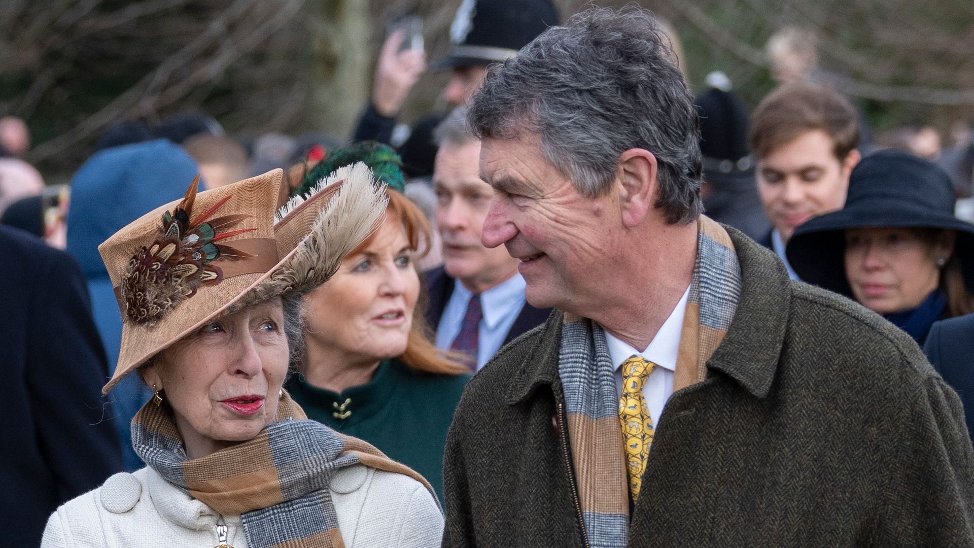 Princess Anne and Sir Tim Laurence walk to church on Christmas Day