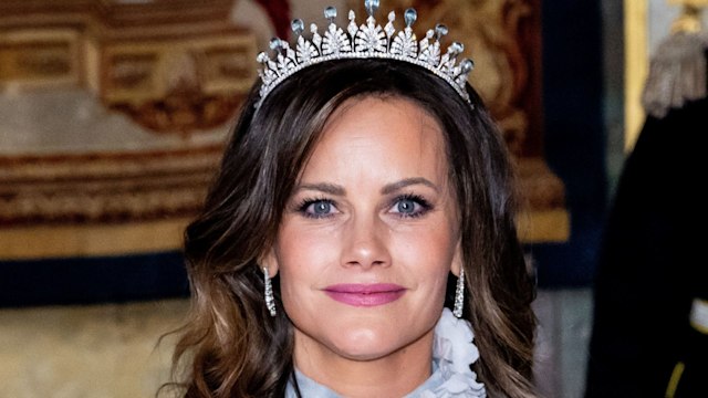 Princess Sofia of Sweden wearing a blue dress and silver tiara