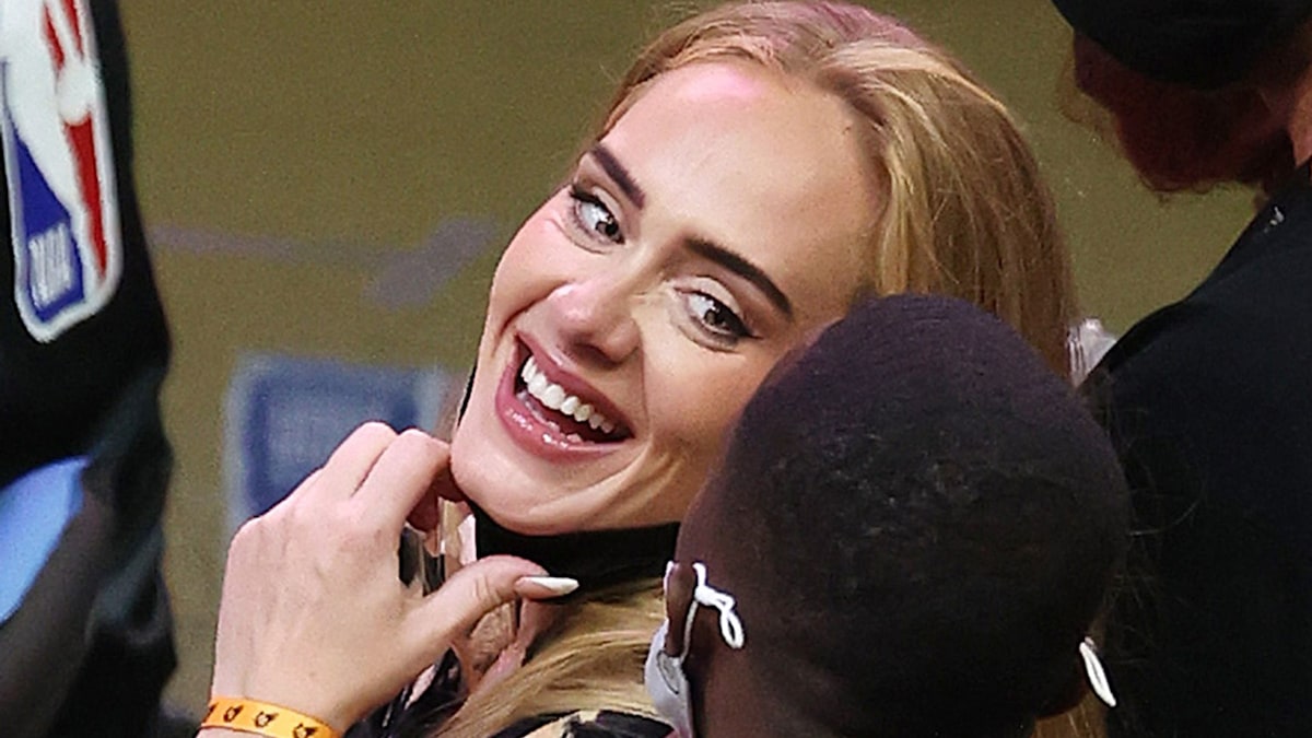 Adele stuns in skintight leather outfit in rare pic with boyfriend