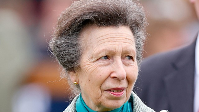 Princess Anne in blazer and silky teal blouse